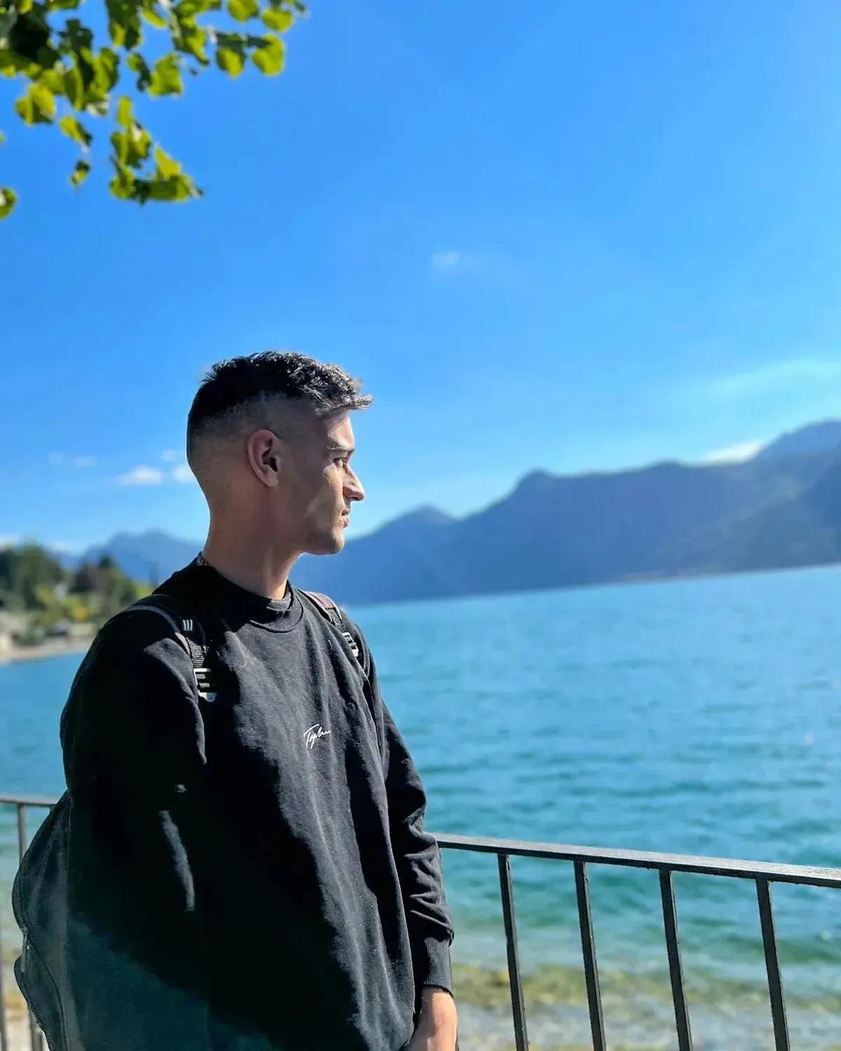 Nathaniel Azzopardi Borg looking at Lake Como (Italy)